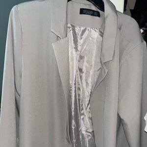 Medium length light purple blazer. Never worn!